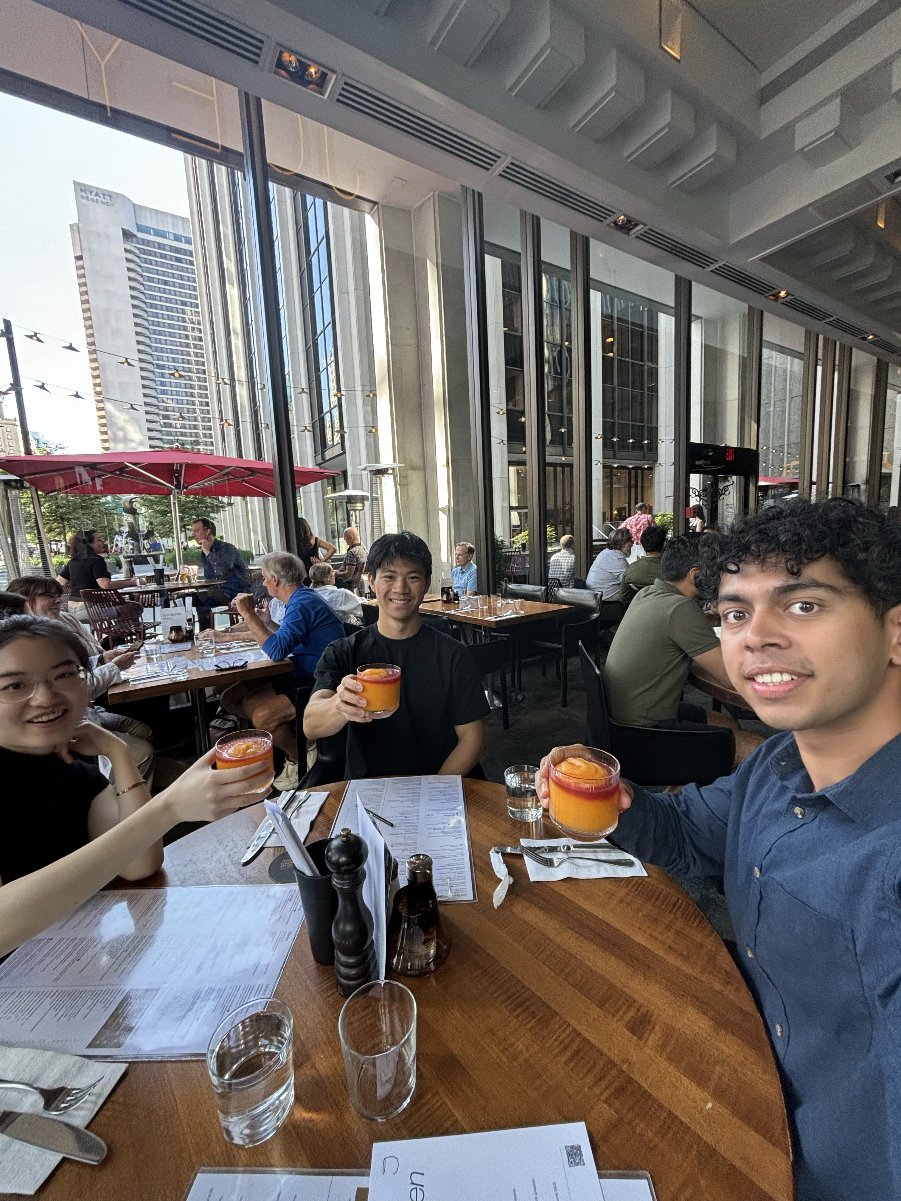 The WorkInProgress founding team at a restaurant patio in downtown Vancouver